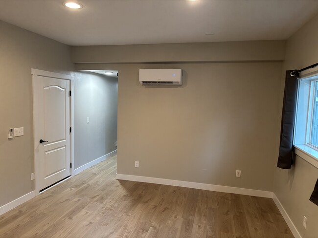 Remote controlled heating and cooling systems (mini-split) in the living room and bedroom. - 1504 W 7th Pl