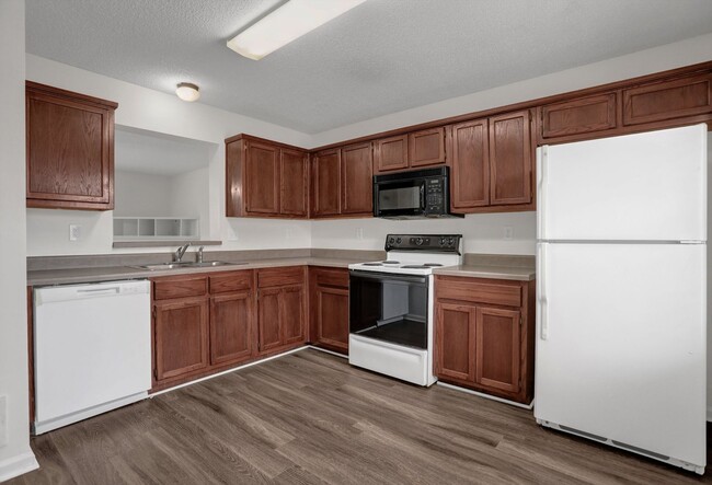 Building Photo - Pre-Leasing Now 3 bedroom townhome with fe...