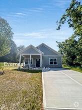 Building Photo - 301 S Pinchback Ave