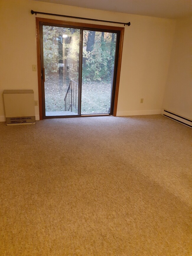 living room with heat smart unit - 710 Main St