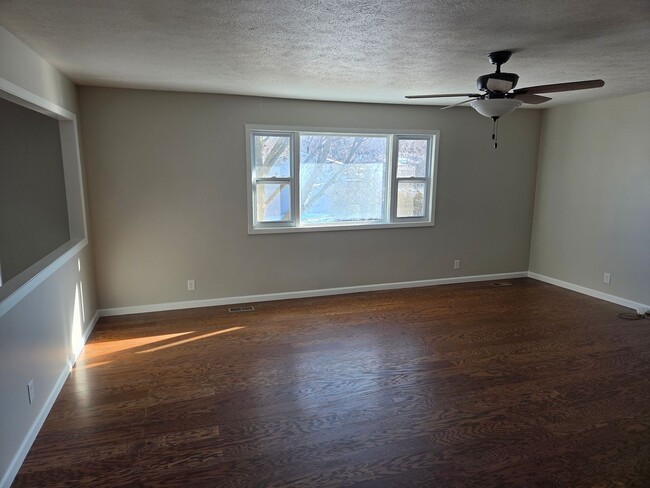 Photo - 4 bed 2.5 bath with a 2 car garage and fenced backyard House