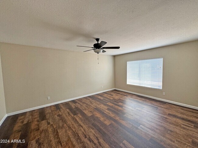 Building Photo - 5112 E Charter Oak Rd