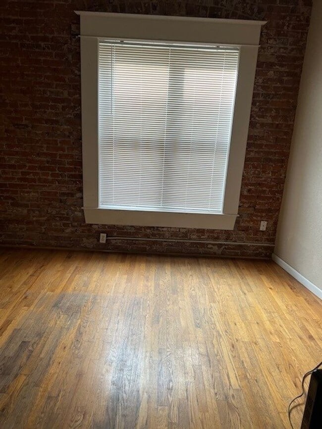 Building Photo - PRICED REDUCED!! Large windows and exposed...