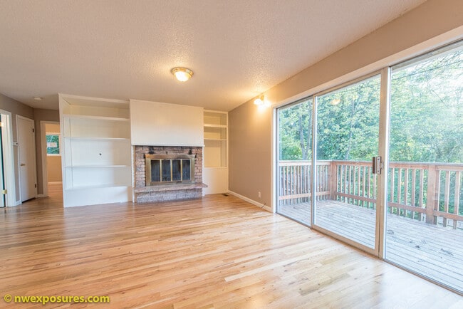 Building Photo - Charming 4-Bedroom Home with Dual Decks an...