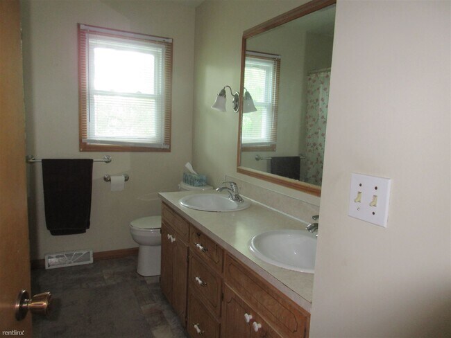 Foto del edificio - 4 br, 2.5 bath House - 6855 Bonnie Ave SE ...