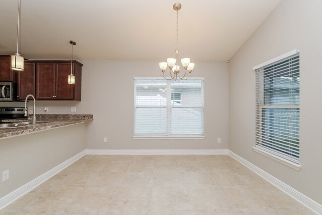 Building Photo - 7163 Wirevine Dr