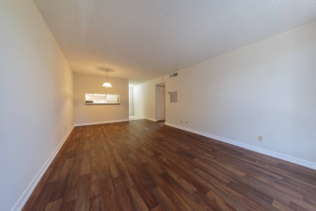 Apartment Home| Living Room & Kitchen | Upgrad - Sunset Palms Apartments