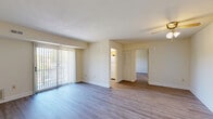 Located at 102 Waldon Rd in Abingdon, MD, this one-bedroom, one-bathroom unit offers a well-organized layout across a single floor. The living room is a bright, open space highlighted by wood-style laminate flooring, neutral cream-toned walls, and a ceiling fan with a light fixture. A sliding glass door fills the room with natural light and provides access to outdoor views, while a closet near the entry keeps the space tidy and functional.

The generously sized bedroom continues the wood-style flooring and features a large window that brings in additional natural light, along with a dedicated closet for storage. The kitchen is efficiently designed with warm honey-toned wood cabinetry, light countertops, and a full suite of white appliances including a gas range, dishwasher, refrigerator, and over-range microwave. A window above the sink adds pleasant natural light to the workspace.

The bathroom offers a clean, practical design with tile flooring, a wood-toned vanity with a white countertop, and a well-appointed layout. Throughout the unit, consistent flooring, neutral tones, and thoughtful details create a cohesive and comfortable living environment well-suited for everyday living.