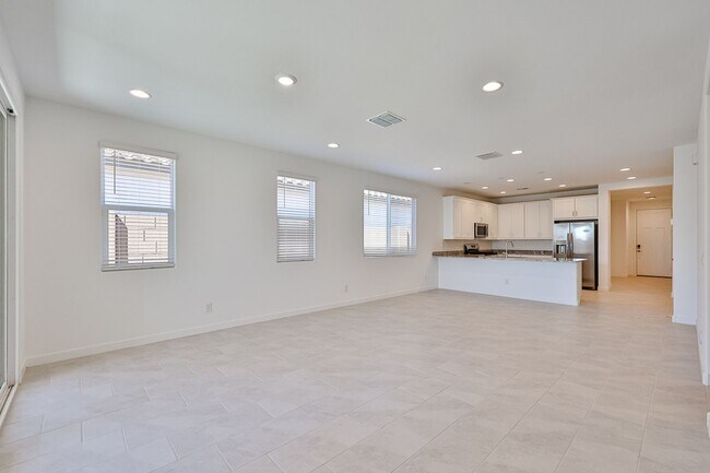 Building Photo - New 5-Bedroom Home in Goodyear with Upgrad...