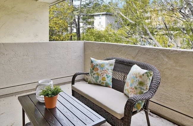 Building Photo - Welcome to this sun-filled spacious top fl...