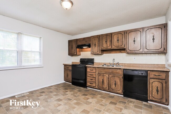 Foto del edificio - 4841 Rose Blossom Ln