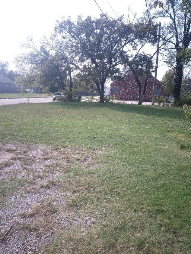 Primary Photo - Cozy 2-Bedroom Home with Large Yard & Stor...