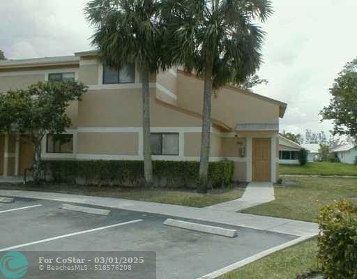 Building Photo - 9456 S Palm Dr