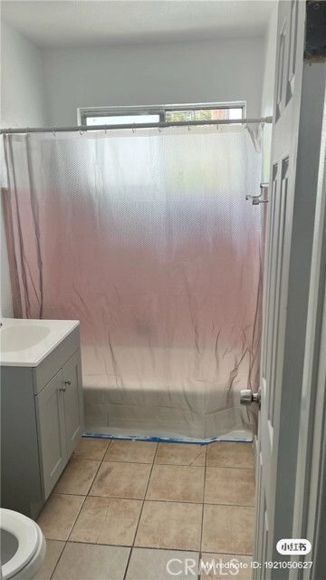 Foto del edificio - 1194 W 39th St