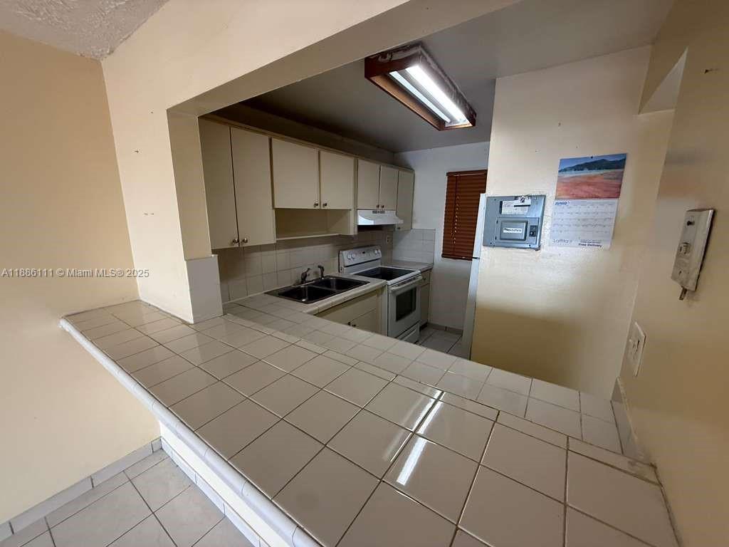 Foto principal - 6055 W 19th Ave