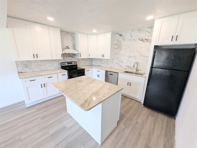 Foto del edificio - 2911 Huckleberry Ln