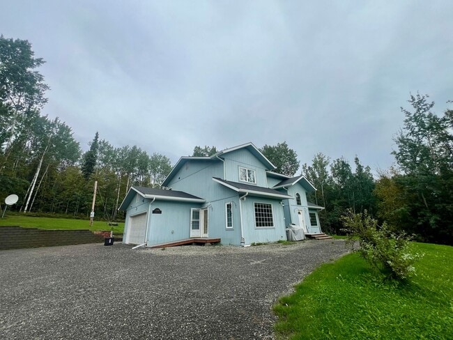 Building Photo - Spacious 3BR/2.5BA Fairbanks Home – Garage...