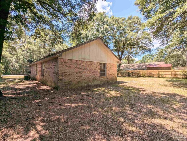 Foto del edificio - 6556 Bass Ln