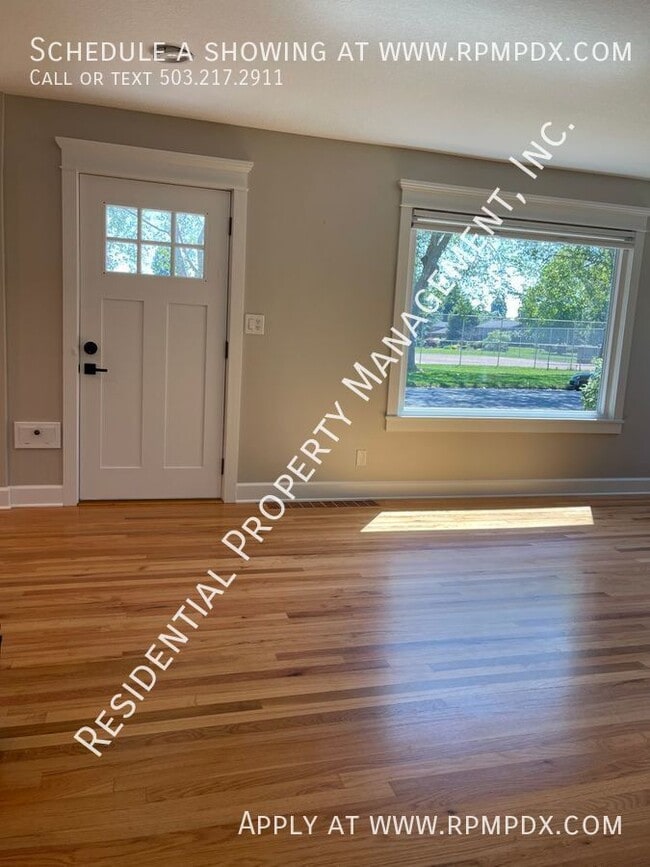 Building Photo - 7065 N Woolsey Ave