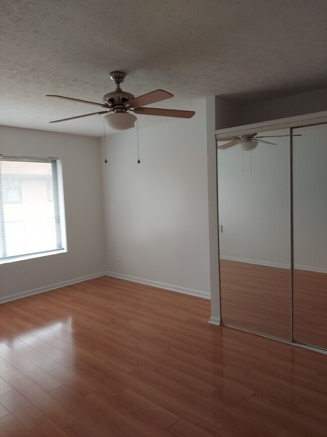 Master bedroom with half bath - 7088 Wildwood Cir