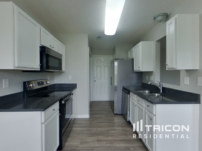 Foto del edificio - 6910 Vernon Wood Ln