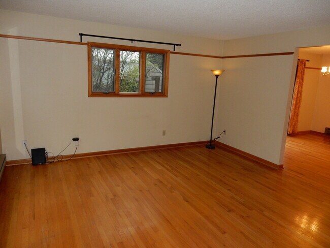 Spacious living room with hardwood floors. - 2169 NE Multnomah St