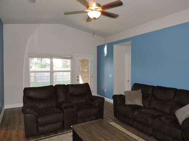 Building Photo - Almost new four bedroom home with solar pa...