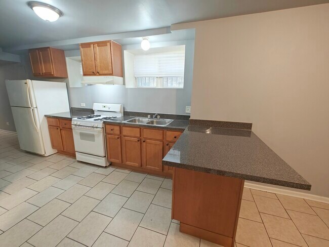 Foto del edificio - 6030 S Eberhart Ave