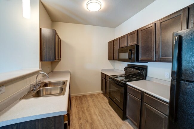 Cocina totalmente equipada - Grand Station Apartment Homes