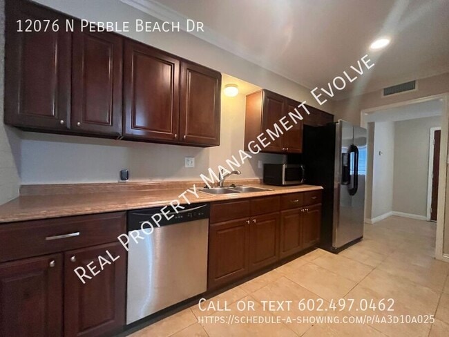 Foto del edificio - 12076 N Pebble Beach Dr