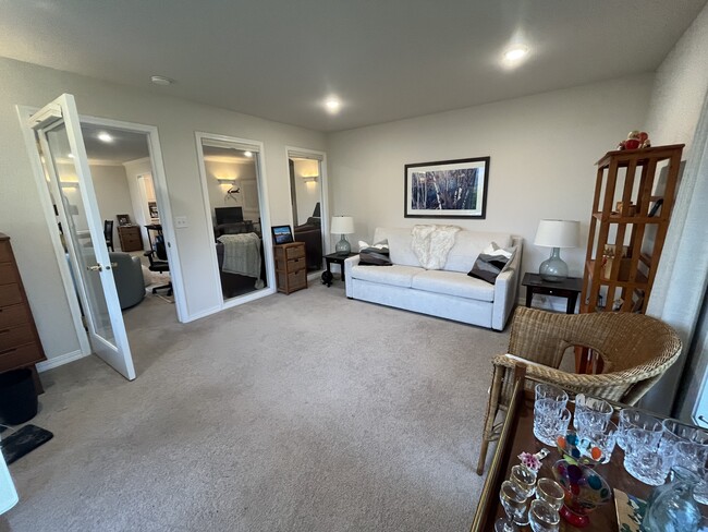 Den/2nd bedroom with blinds that cover the windows for privacy. - 1725 Elison Ln