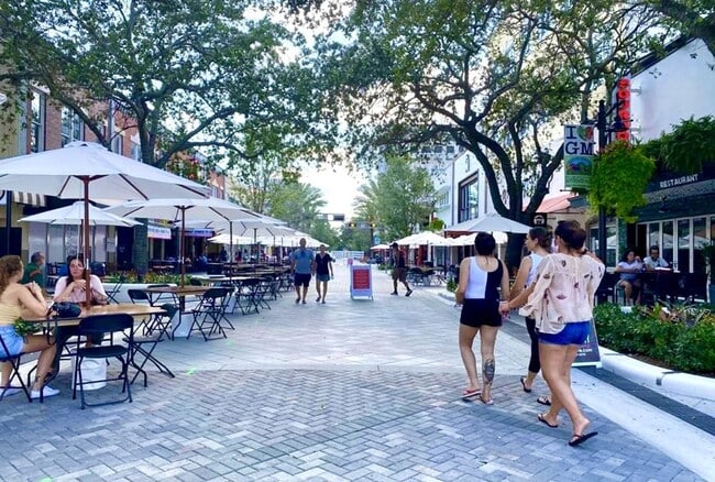Explore the vibrant atmosphere of Ponte Verde Apartments at Palm Beach Lakes, where trendy outdoor dining and social spaces await. Stroll through picturesque paths and enjoy nearby attractions. Don't miss out—schedule your visit today! - Ponte Verde Apartments At Palm Beach Lakes
