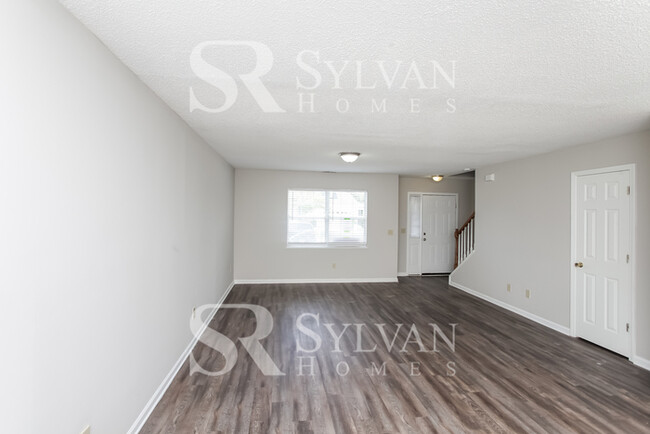 Building Photo - Step into this captivating 4-bedroom, 2.5-...