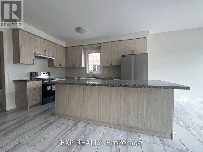 Photo du bâtiment - 9 Kenneth Appleton Ave