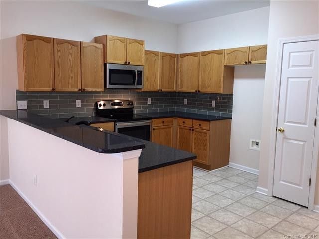 Kitchen with marble countertops - 5426 Franklin Springs Cir