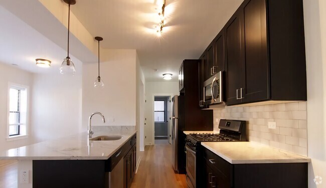Building Photo - 2211 W Eastwood Ave
