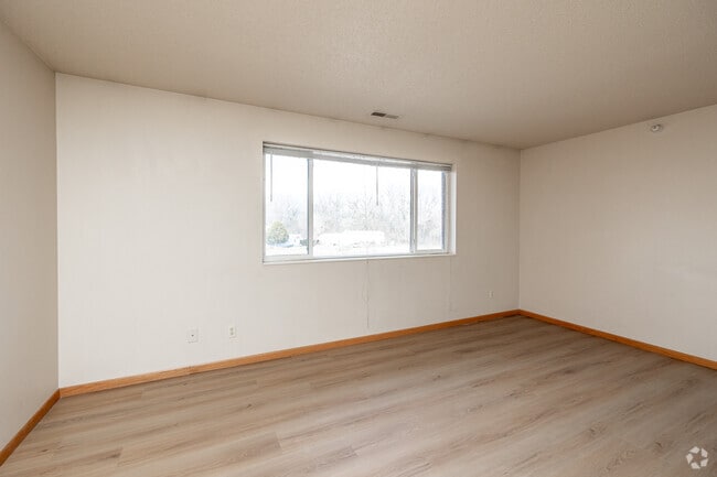 3BR, 2BA - 1,200SF - Living Room - Campus Court Apartments