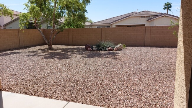 Backyard from patio - 8763 W State Ave