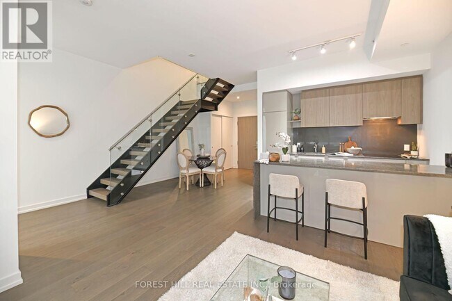 Photo du bâtiment - 161-161 Roehampton Ave