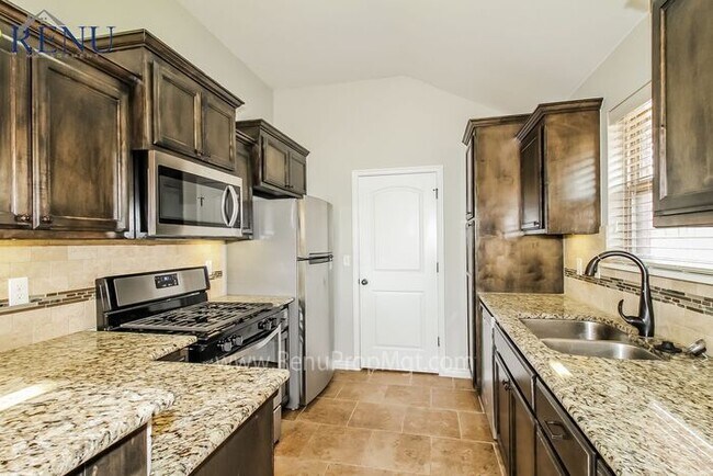 Building Photo - SPECIAL: 50% off first month's rent!  This...