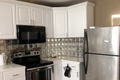 Kitchen with stainless Steel appliances - 1214 Speed St