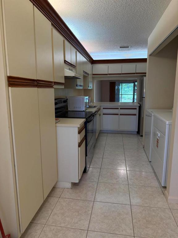 Building Photo - 12028 Royal Palm Blvd