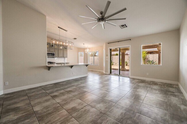 Building Photo - STUNNING 3 Bedroom Home with a 3 CAR GARAGE & RV PARKING!