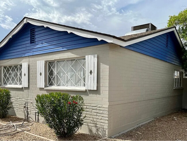 Front of the house, house newly painted - 6902 E Latham St
