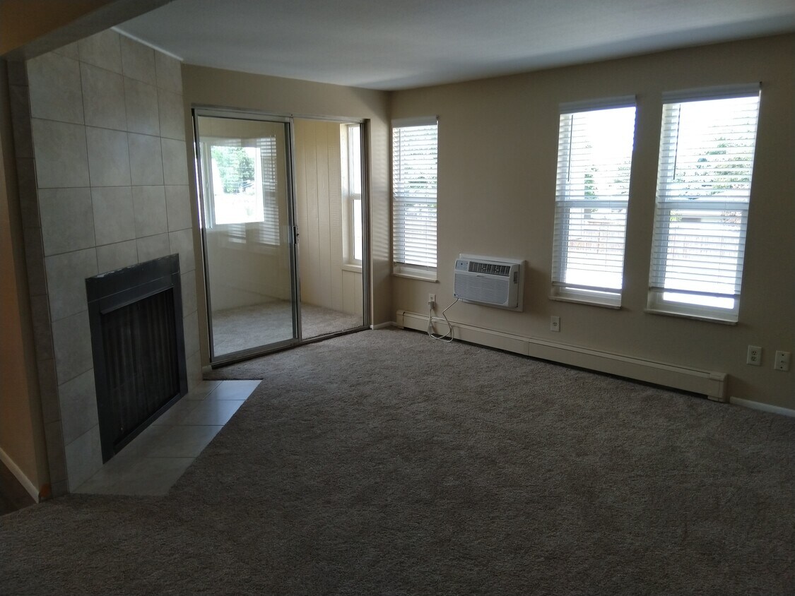 Living Room with Wood Buring Fireplace - 8840 W Jewell Ave