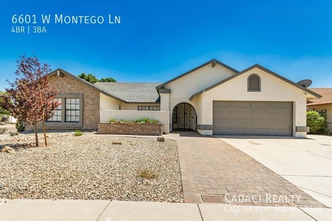 Building Photo - 4 bedroom 3 bathrooms 2 car garage, RV Gate