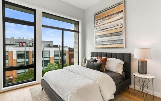 Building Photo - Sophisticated two-bedroom condo with ample...