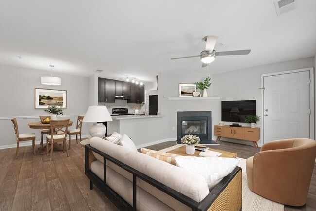Elevate your lifestyle at Eagle Rock Apartments at Abingdon. This inviting living space features modern finishes, an open layout, and a cozy fireplace, perfect for relaxation and entertainment. Explore your new home today and make it yours! - Eagle Rock Apartments at Abingdon
