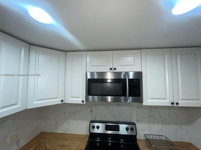 Building Photo - 8000 Lagos De Campo Blvd
