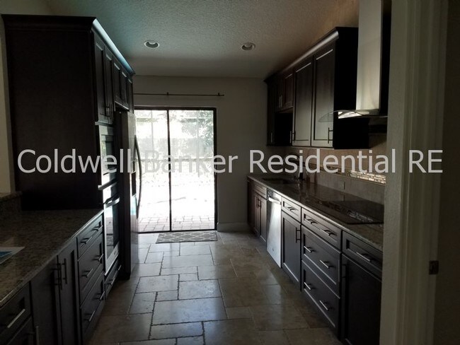Building Photo - 8019 N Madeira Ct